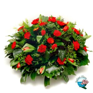 Composizione funebre di fiori rossi